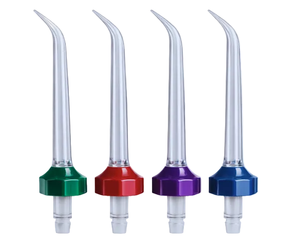 Four dental nozzles with colored bases on a light blue background
