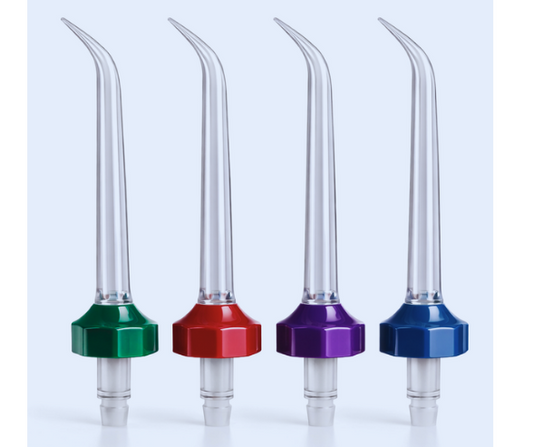 Four dental nozzles with colored bases on a light blue background